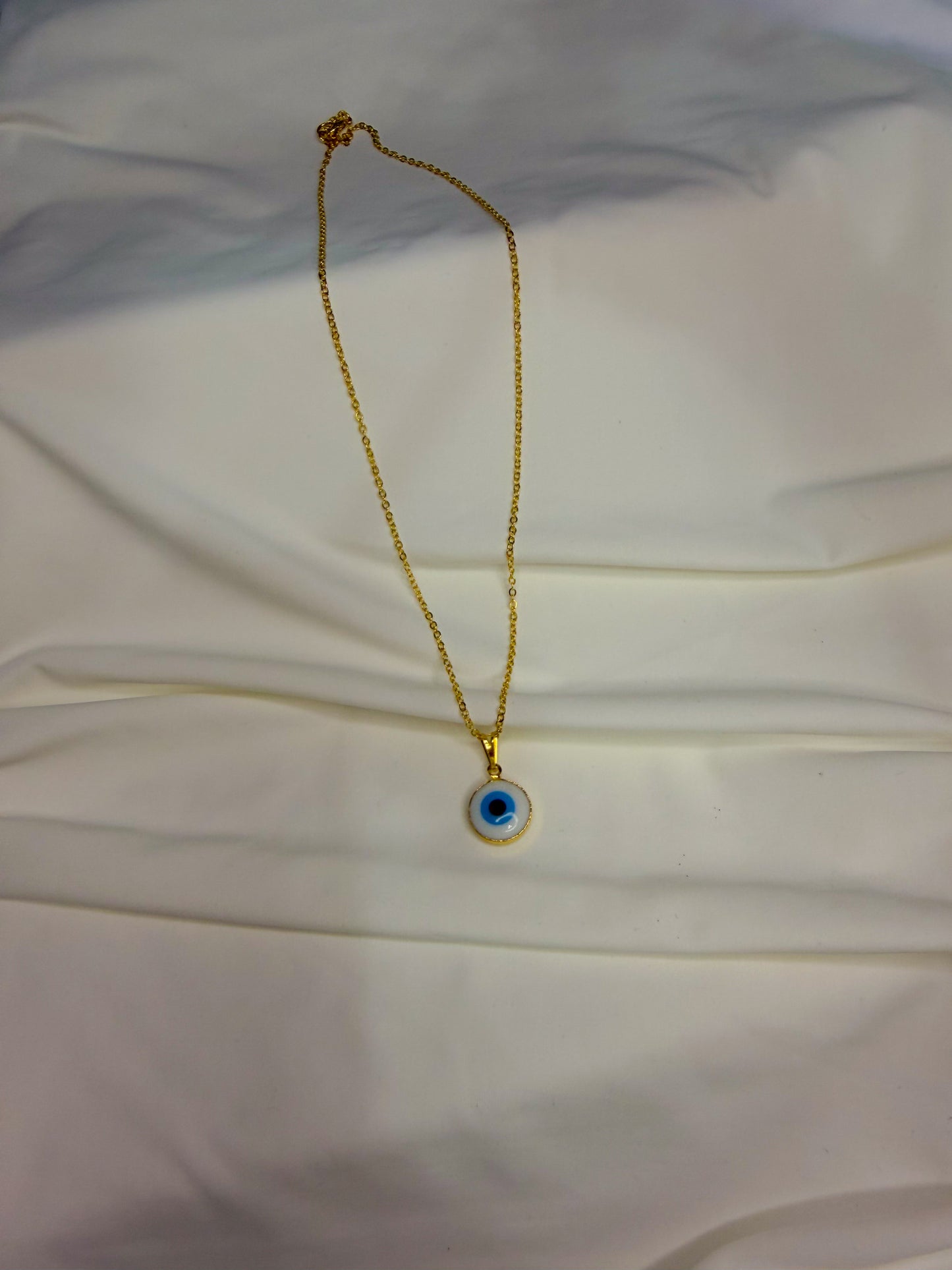 Gold plated necklace evil eye