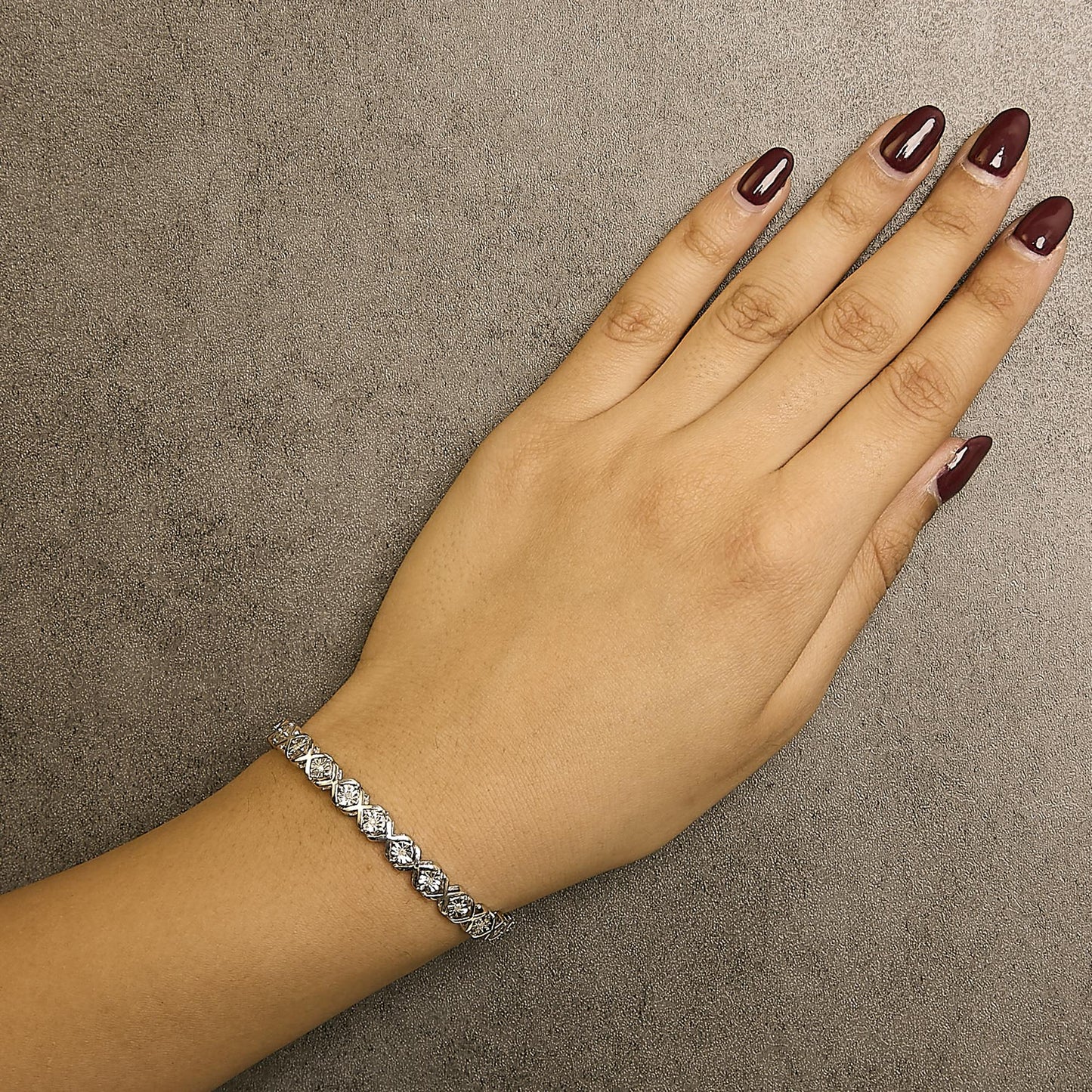 .925 Sterling Silver 1/4 Cttw Miracle Set Diamond "X" Link Bracelet (I-J Color, I3 Clarity) - 7.25"