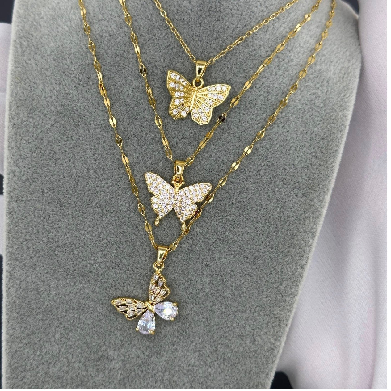 “BUTTERFLY" NECKLACE,  GOLD
